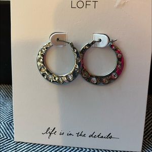 LOFT SILVER HOOPS with inserted clear stones.